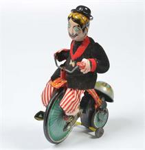 TPS, Clown auf Dreirad