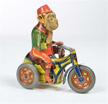 Arnold, Affe auf Dreirad