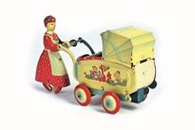 Haji, Frau mit Kinderwagen
