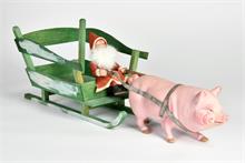 Weihnachtsmann auf Schweineschlitten