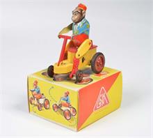 Köhler, Affe auf Dreirad