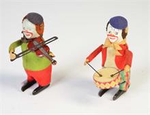 Schuco, 2 Clowns mit Trommel + Geige