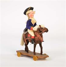 Napoleon mit Porzellankopf auf Pferd