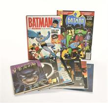 9 Batman Comics + 1 Buch