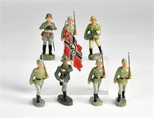 7 deutsche Soldaten, davon 1 Fahnenträger