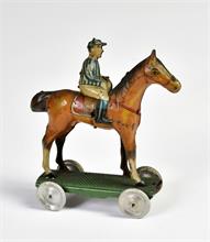 Jockey auf Pferd Penny Toy