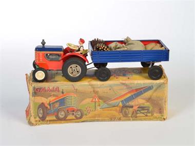 Gama, Traktor mit Anhänger + Ladegut