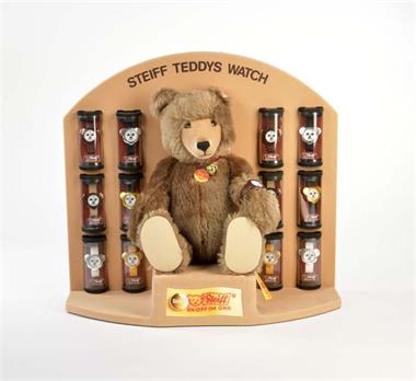 Steiff, Watch Teddy mit Uhr + 12 Steiff Uhren in original Display