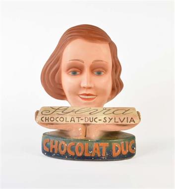 Werbefigur "Chocolat Duc Sylvia"